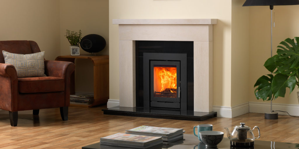 Inset Wood Burning Stove with Sectioned Granite Hearth and Backpanel